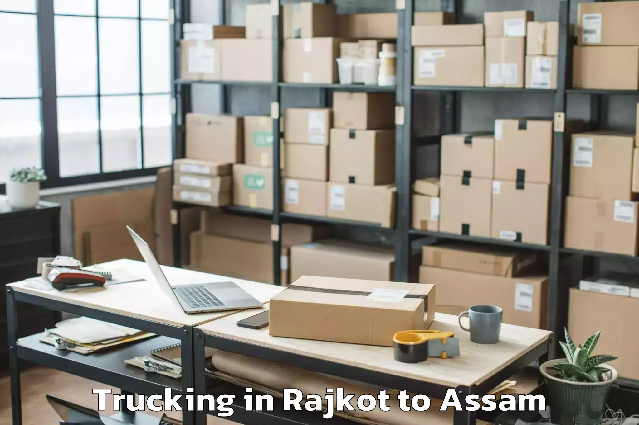 Book Rajkot to Bogribari Trucking Online